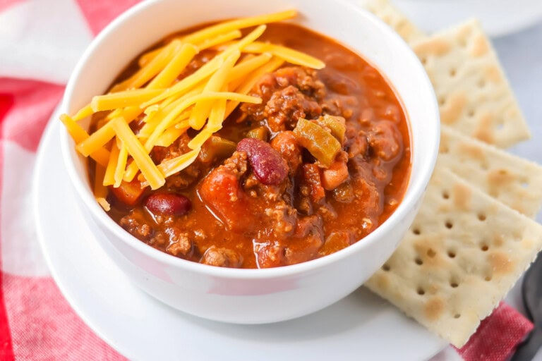 Wendy's chili recipe in bowl with crackers on the side.
