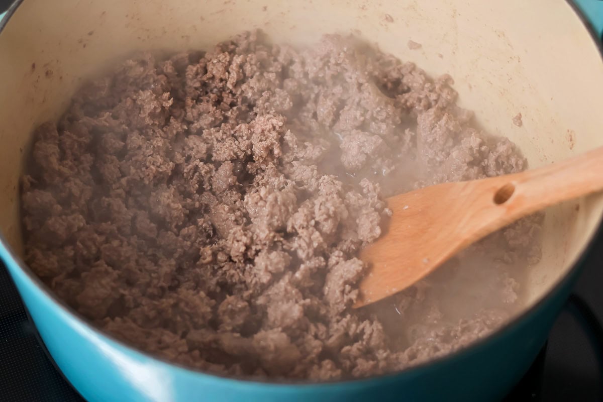 Cooked hamburger in large pot.