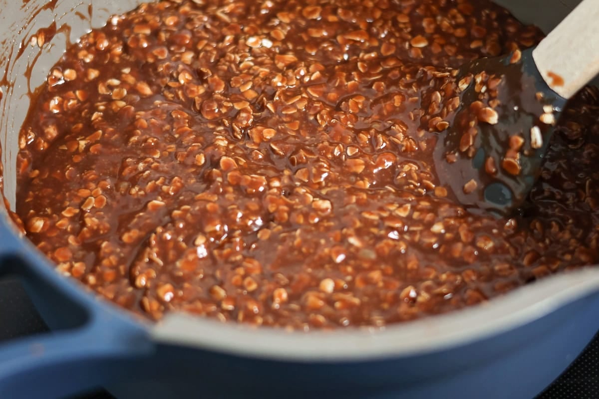 Oats mixed into chocolate and peanut butter mixture for no bake cookies.