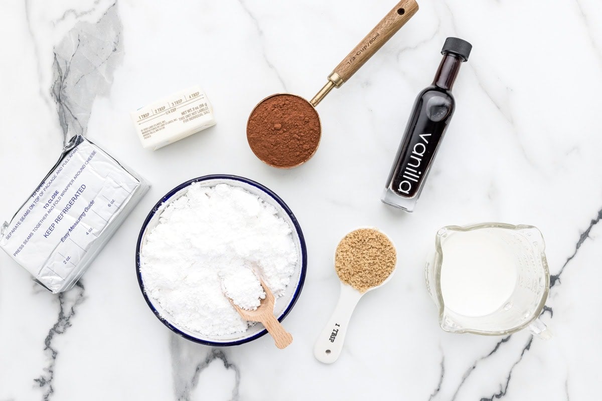 Brownie dip ingredients on white counter.