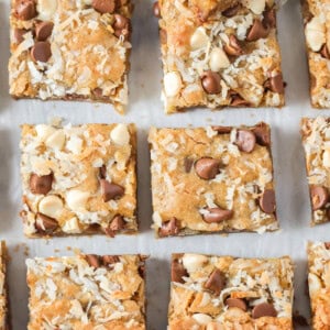 Sliced congo bars on a lined baking sheet.
