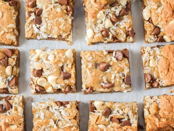 Sliced congo bars on a lined baking sheet.