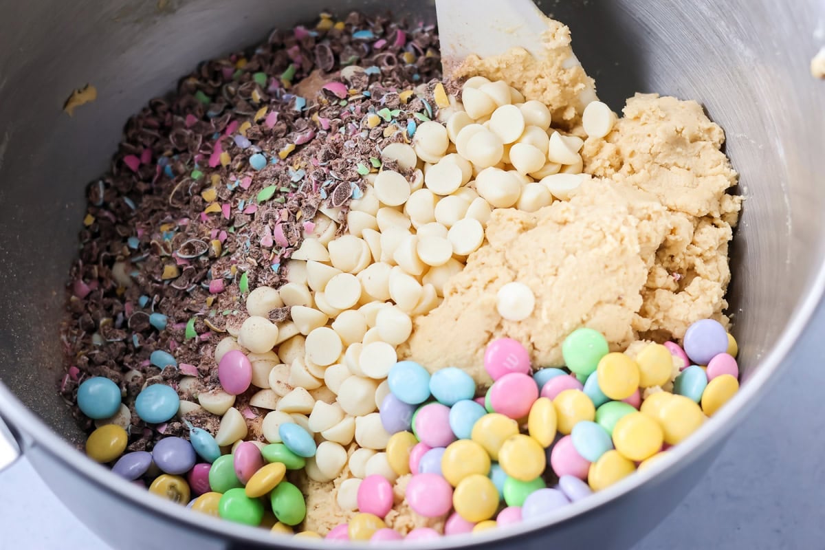 Crushed M&Ms, M&Ms and white chocolate chips mixed into cookie dough.