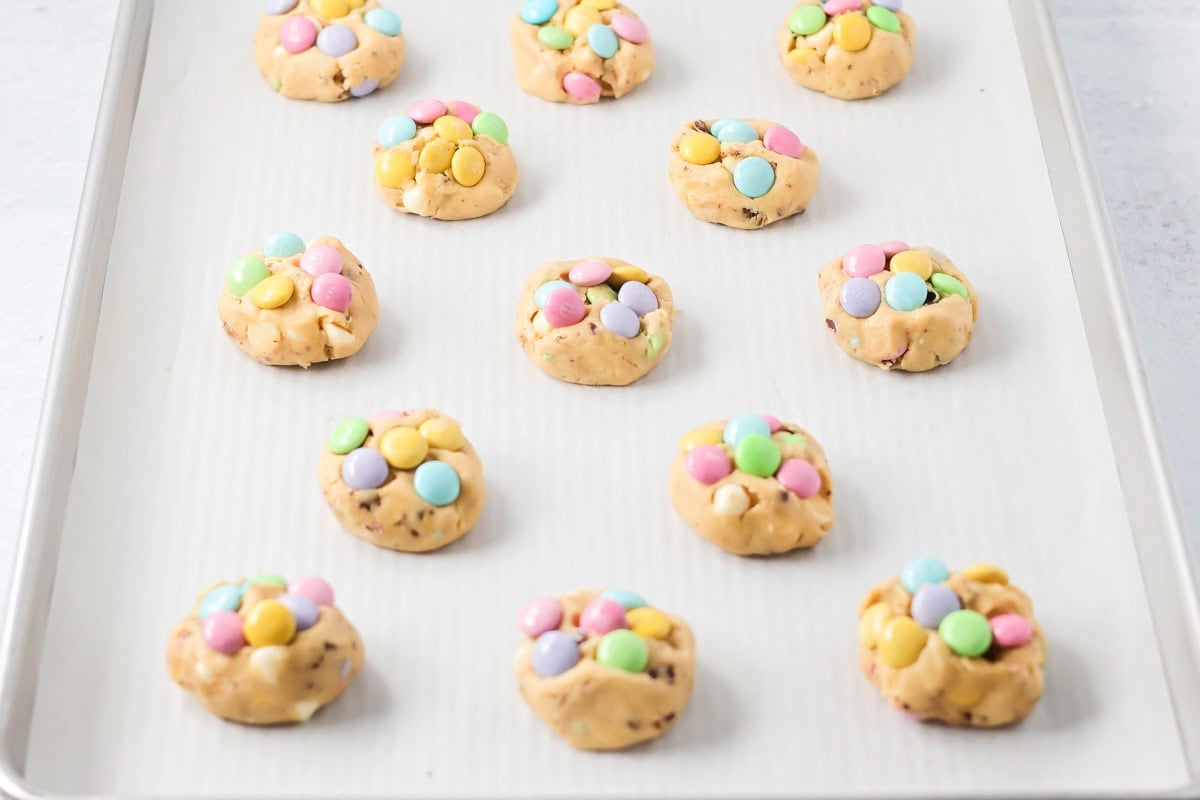 Easter cookies scooped out onto cookie tray.