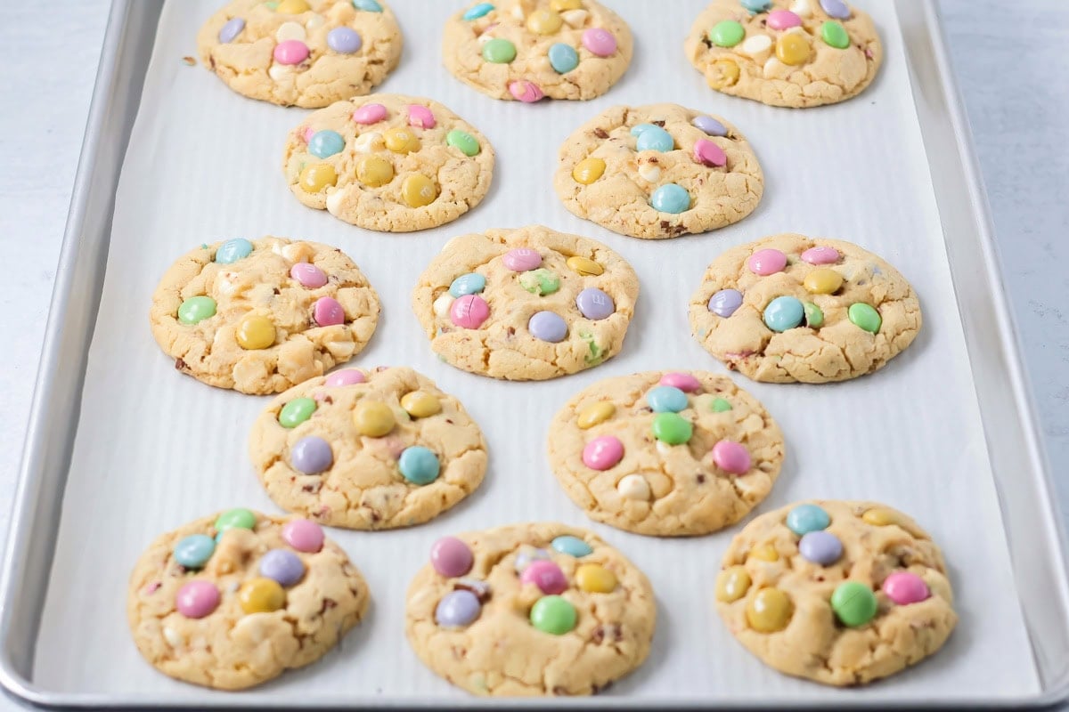 M&M Easter Cookies baked on cookie tray.