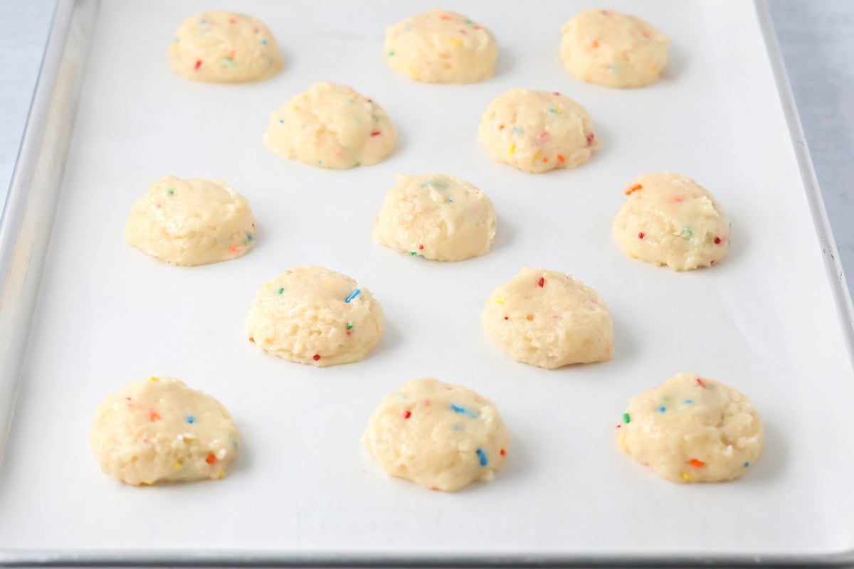 Funfetti cookies on baking sheet.