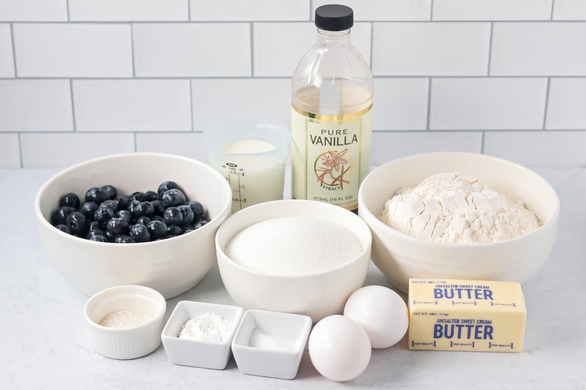 Mini blueberry muffins ingredients on counter.