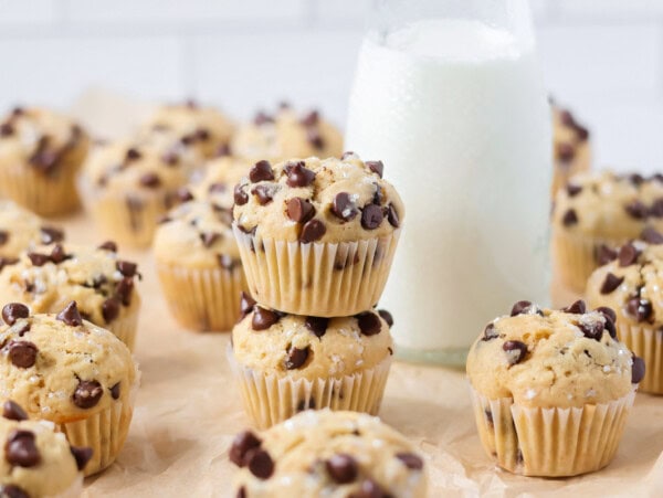 Mini Chocolate chip muffins stacked on top of each other.