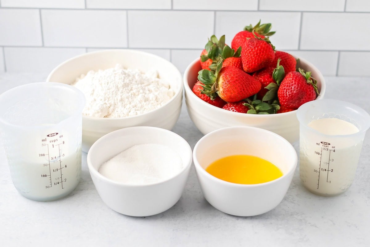 Ingredients for bisquick strawberry shortcake on a kitchen counter.