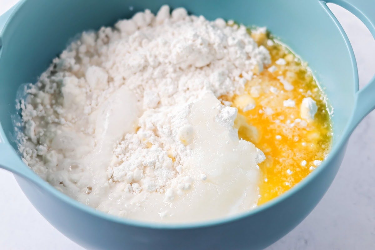 Batter ingredients in a bowl for bisquick strawberry shortcake.
