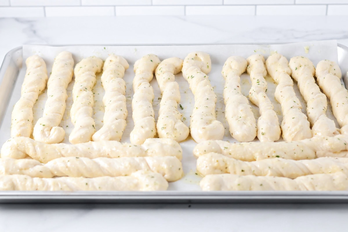Breadsticks rolled and ready to be baked.