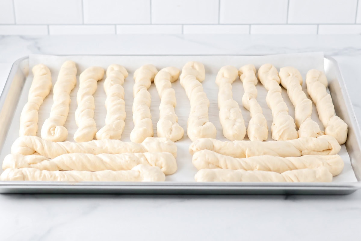 Breadsticks twisted and ready for baking.