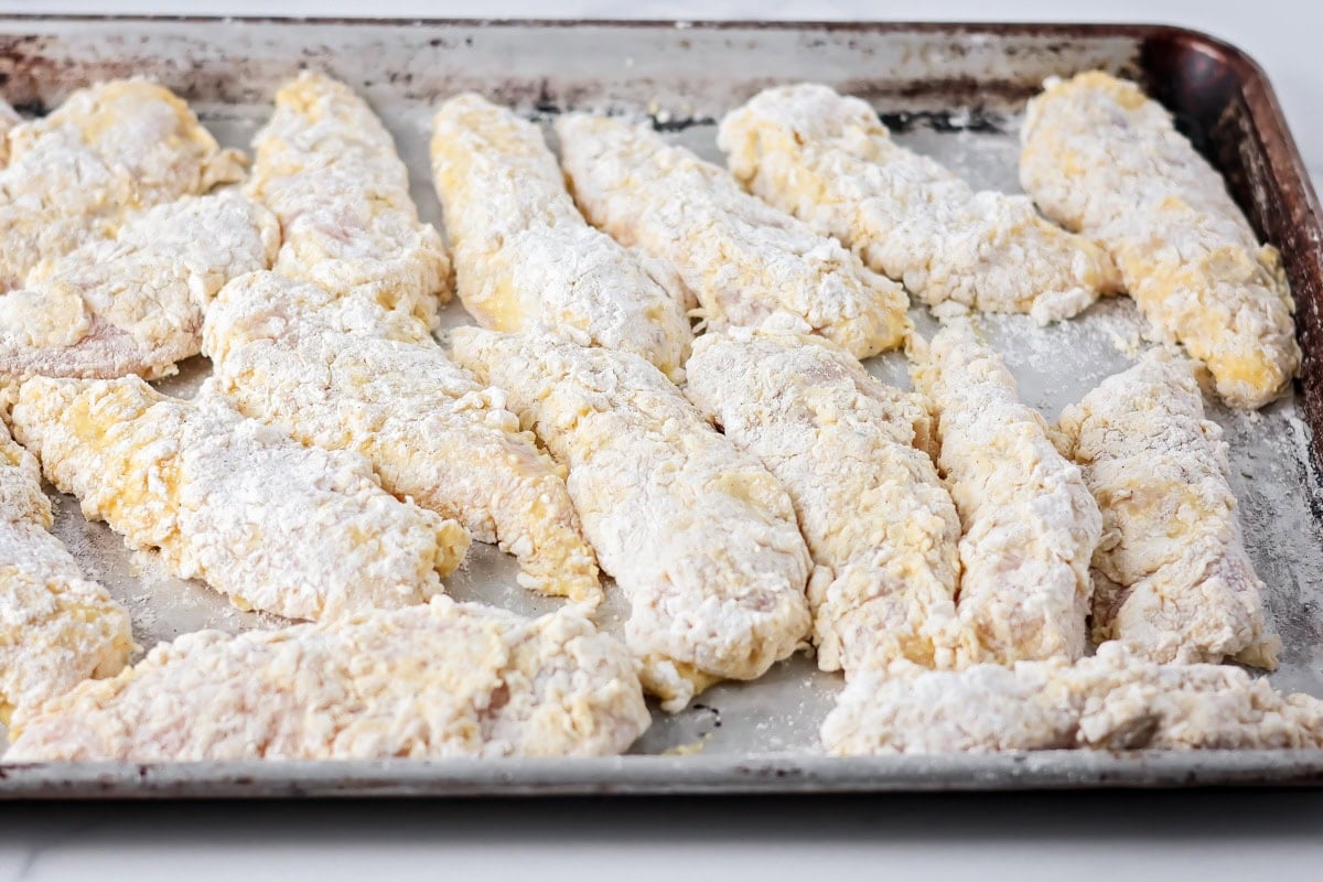 Buffalo chicken tenders double dredge and ready to fry.