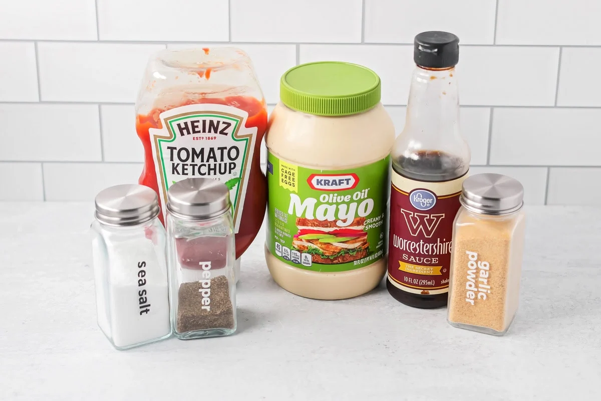 Ingredients for cane's sauce recipe on a kitchen counter.