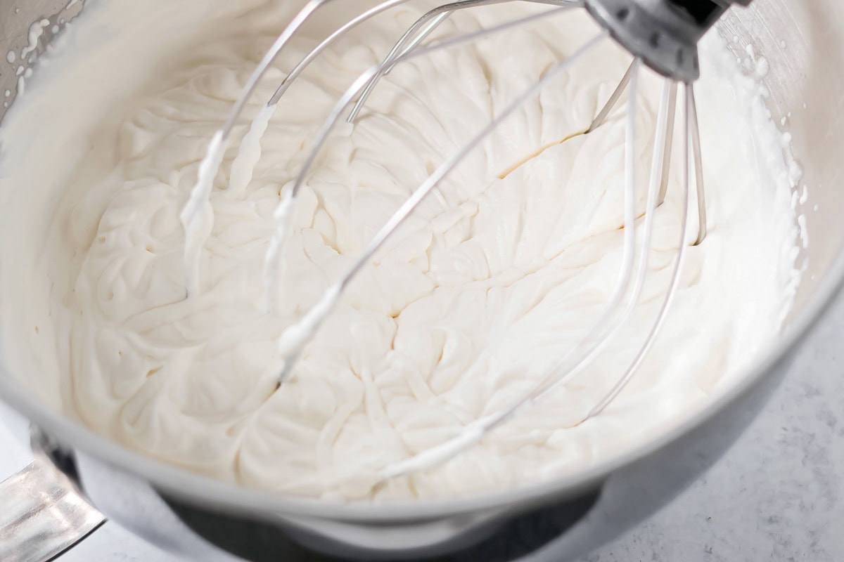 Fresh whipped cream for layering on strawberry shortcake.