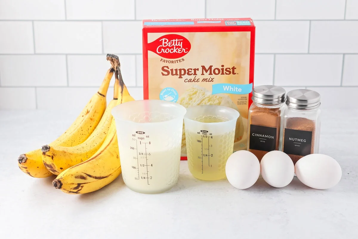 Easy banana cake ingredients on a kitchen counter.
