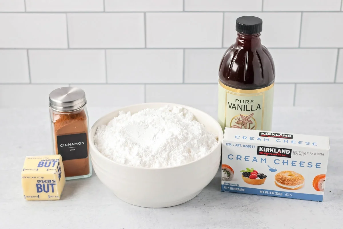 Banana cake frosting ingredients on a kitchen counter.