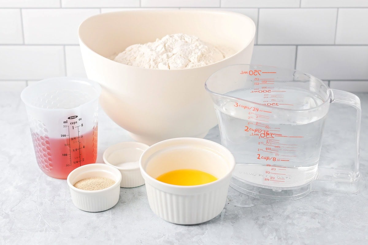 Honey bread ingredients on a kitchen counter.