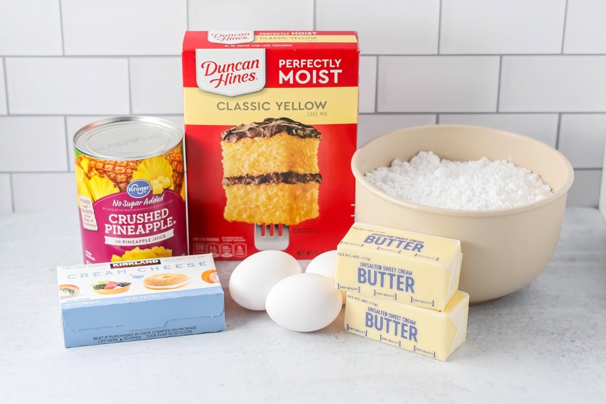 Ingredients for easy pineapple cake on a kitchen counter.