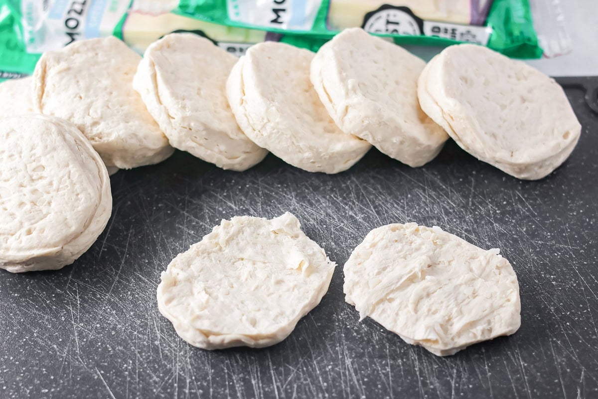 Biscuit dough on a cutting board.