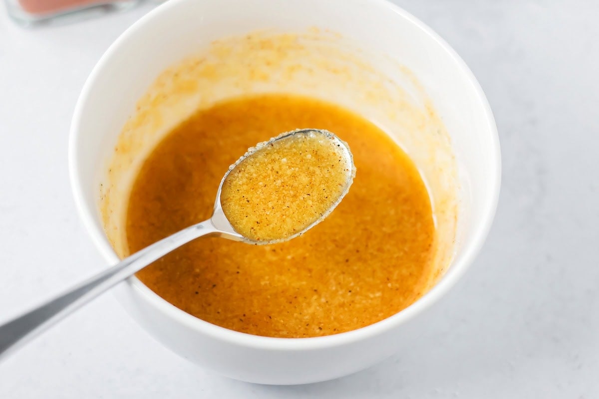 Seasoning and oil mixture in small bowl.