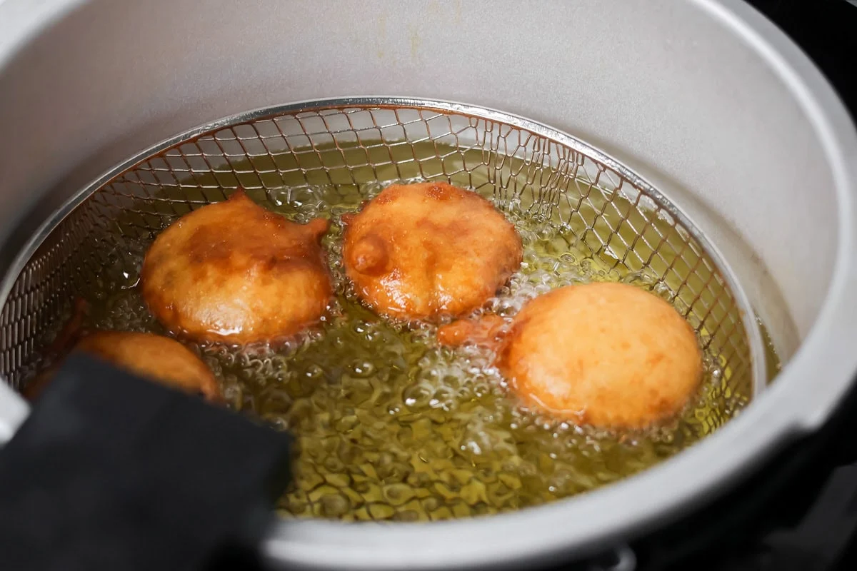 Oreos being fried in oil.