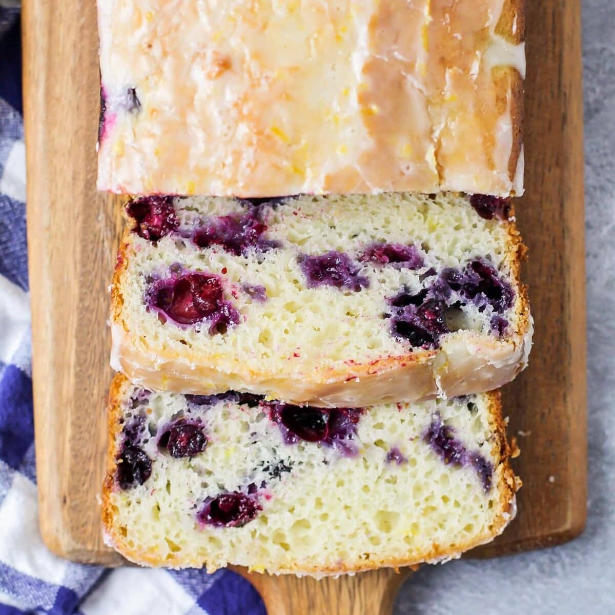 Slices of Lemon Blueberry Bread on cutting board.