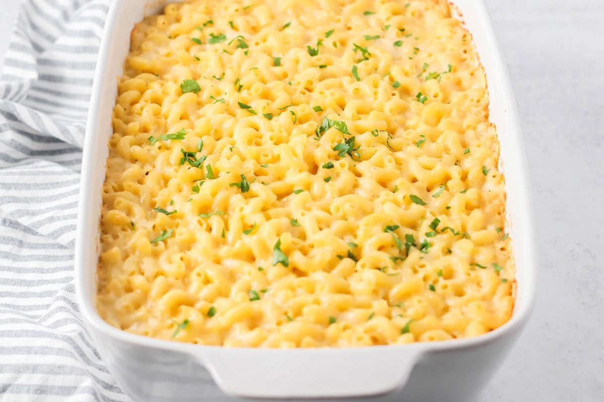 A dish filled with baked mac and cheese.