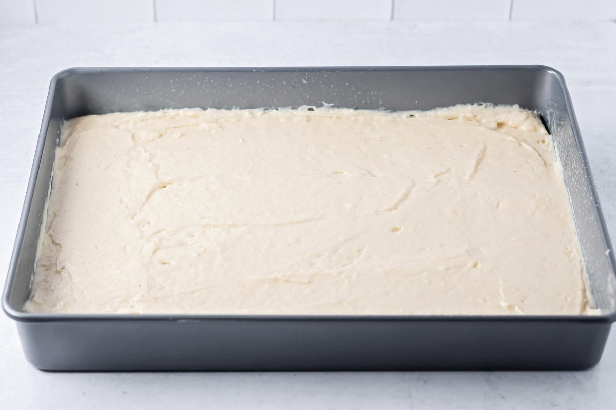 Buttermilk cake batter in a baking dish.