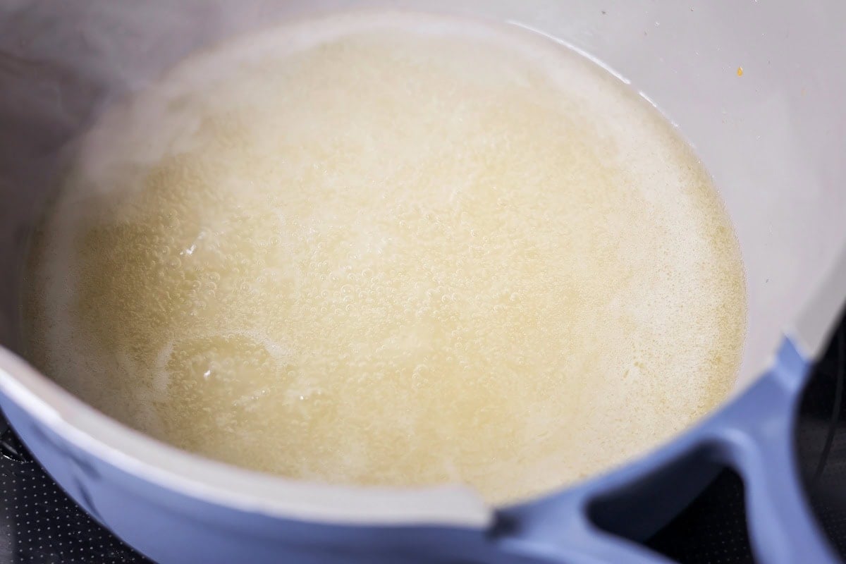 Gravy for crock pot turkey in a pot.