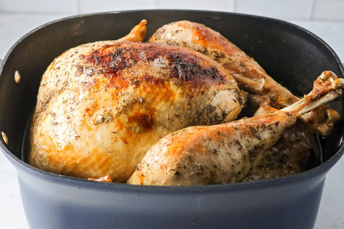 Crock pot turkey in a pan.