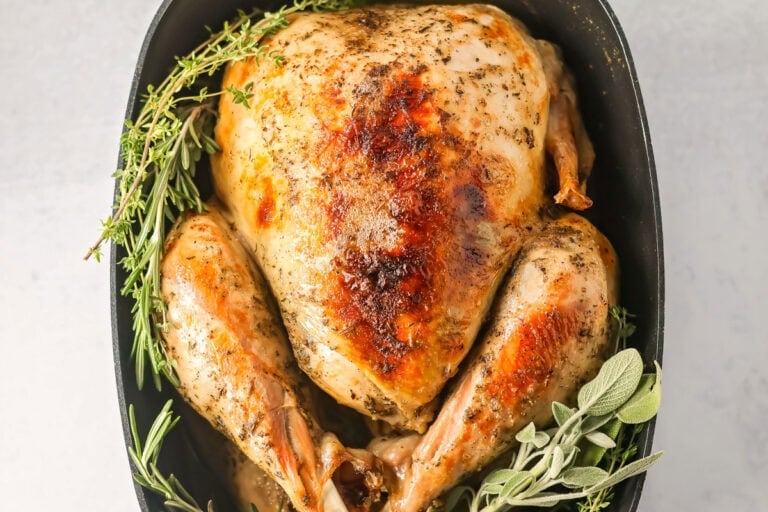A crock pot turkey served with seasonings.