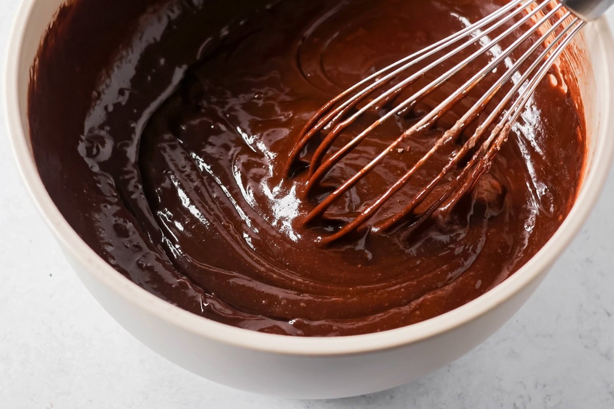 A bowl of brownie batter for making pecan pie brownies.