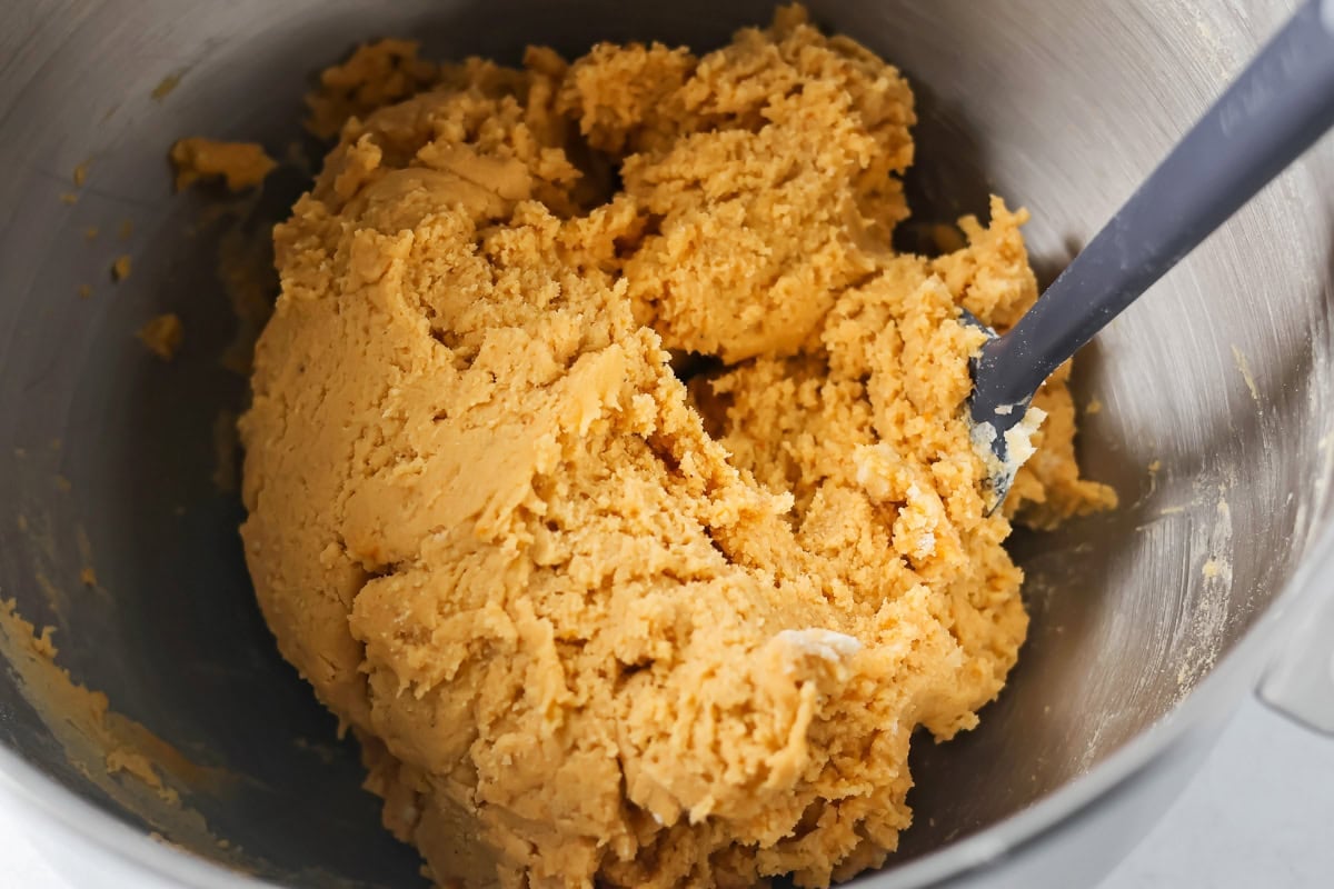 Pumpkin snickerdoodle dough in a mixing bowl.