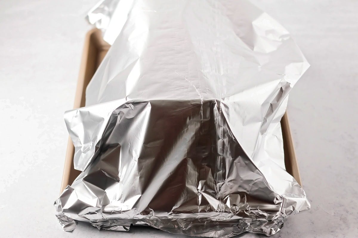 Foil covering a roast turkey breast.