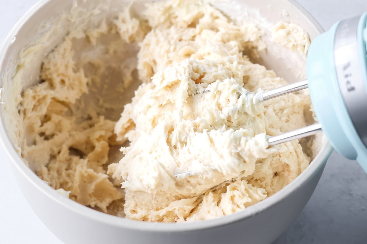 Batter for Christmas sugar cookie bars in a bowl.