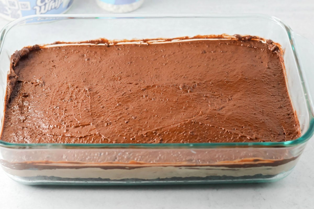 Spreading the next layer on the hot chocolate lasagna.